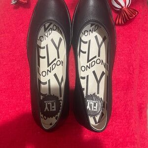 Fly London Women's Black Leather Wedge slip on new